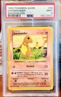 Authentic 1999 Pokemon CHARMANDER SHADOWLESS #46 PSA 9 Mint