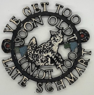 Vintage German Cast Painted Trivet '' Ve Get Too Soon Oldt Undt Too Late Schmart''