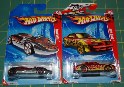 Lot of 2 - 2010 Hot Wheels Race World Volcano - Hot Bird & Twin Mill
