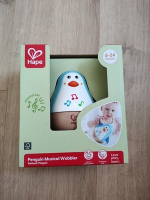 Hape Stehauf-Pinguin, Stehaufmännchen aus Holz, blau, Babyspielzeug ab 6 Monate