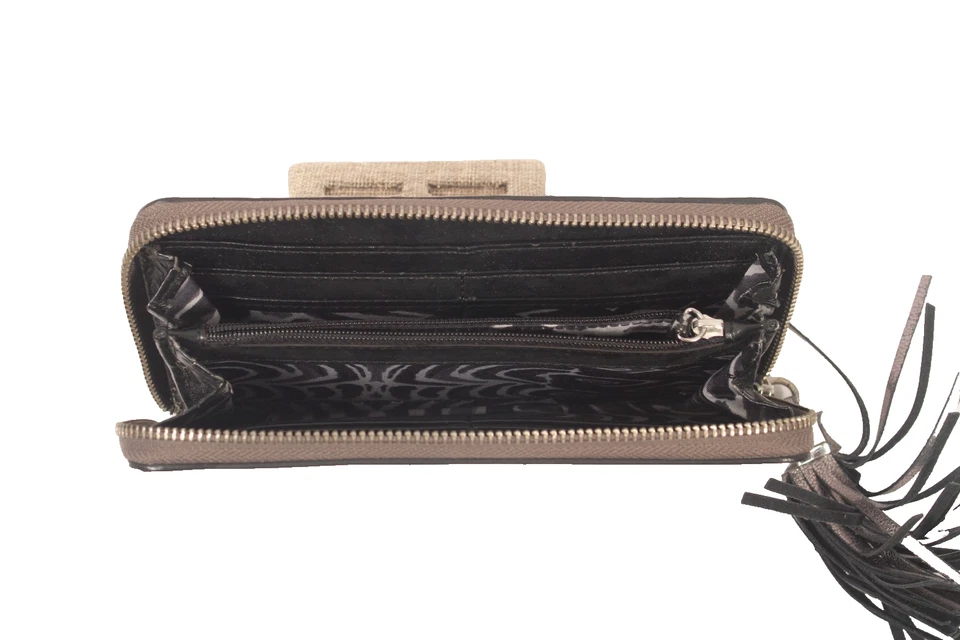 Cartera Stella & Dot de cuero metálico con cremallera y acento de borla ligeramente usada Foto 3 de 4