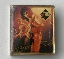 TRUST REPRESSION INSERT STYLE VINTAGE METAL PIN BADGE FROM THE 1980's