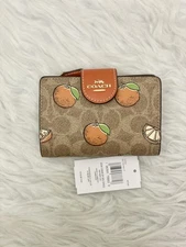 Coach Medium Corner Zip Wallet In Signature Canvas With Orange Print In Tan NWT