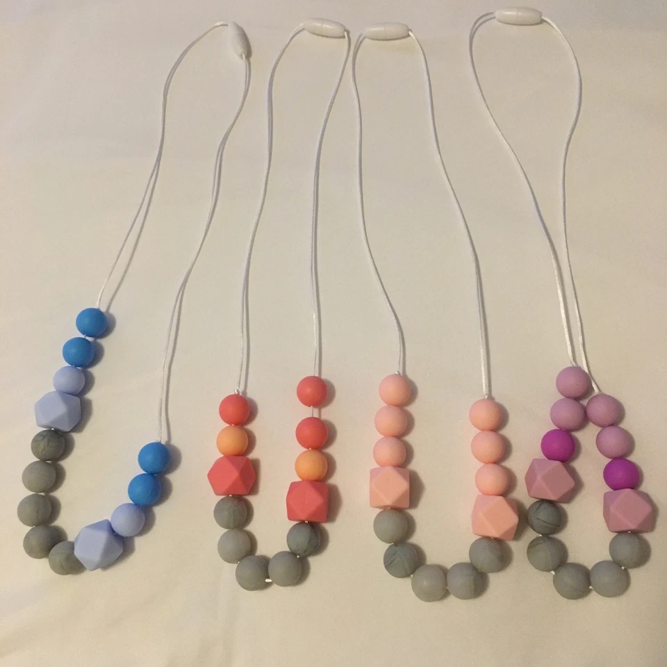 Juego de 4 collares para madres lactantes. Foto 2 de 4