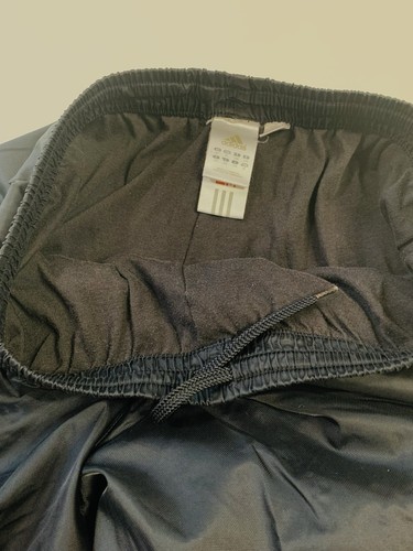 Pantalones cortavientos vintage Adidas para hombre XL negros de nailon con cremallera al tobillo - Imagen 11 de 12