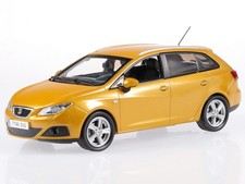 Seat Ibiza ST yellow Tribu metallic diecast model car in acrylic show case 1:43