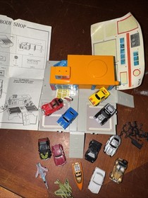 Vintage Micro Machines Travel City Body Shop W/ 14 Vehicles Cars Boat Jets 1980s