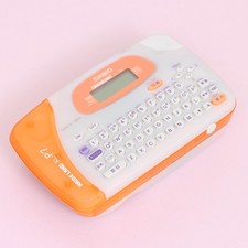 Vintage CASIO KL-P7 NAME LAND Label Maker in Translucent Orange (Japanese)
