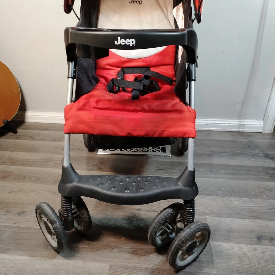 Cochecito de bebé de viaje compacto ligero fácil de plegar Kolcraft Jeep Cherokee Foto 2 de 4