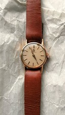 montre omega femme plaqué or 80 microns