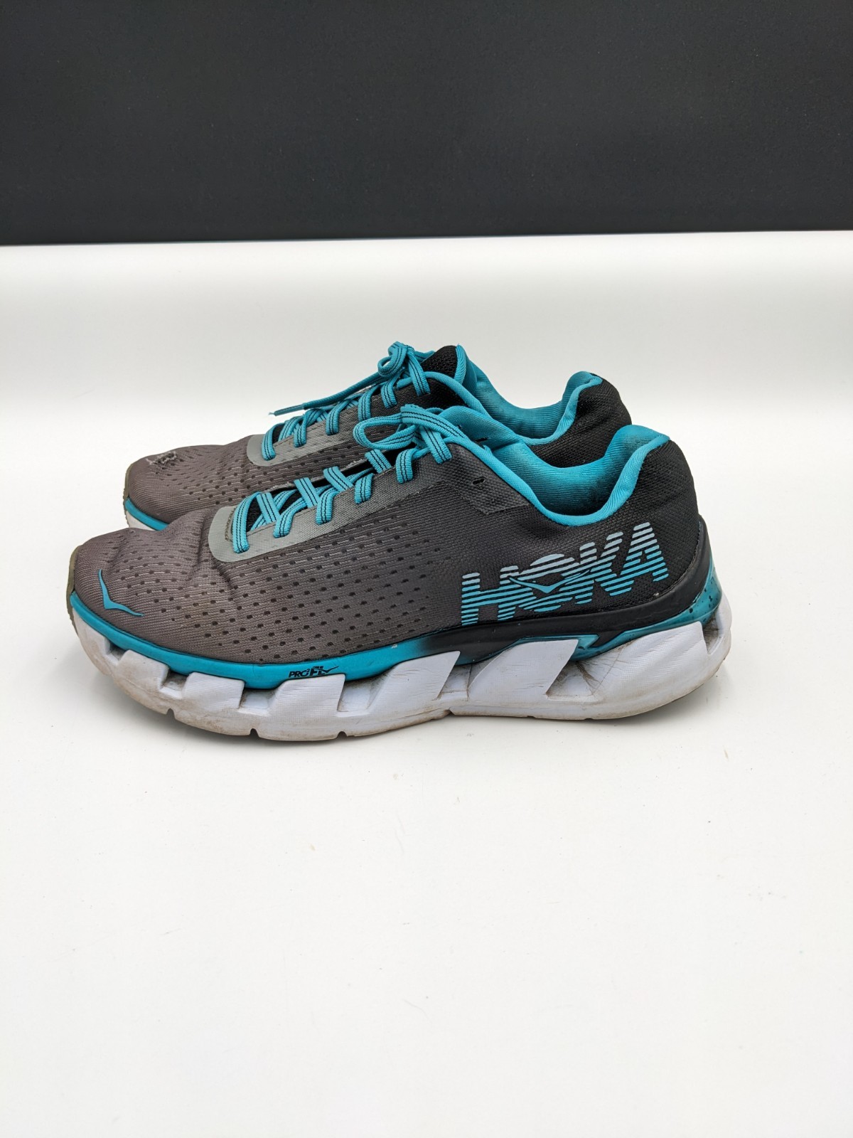 Hoka One One Elevon Road Running Shoes Womens Size 8 Black Blue Bird HAS A HOLE