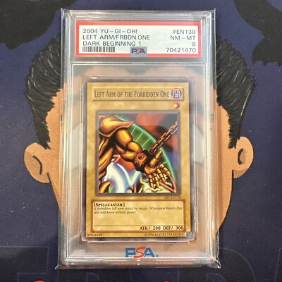 PSA 8 NEAR MINT 2004 YU-GI-Oh! DB1 LEFT ARM OF FORBIDDEN ONE EN138