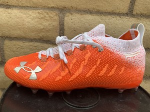 orange under armour soccer cleats