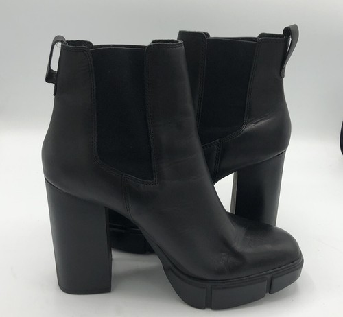 Triple Black Leather Heeled Boots. Size 