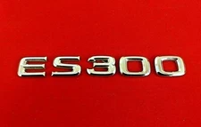 2002-2003 LEXUS ES300 EMBLEM LOGO BADGE SYMBOL CHROME LETTERS OEM