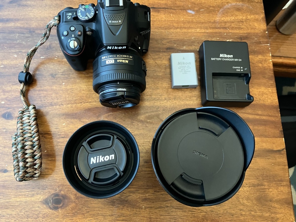 Nikon D5300 DSLR Camera with 3 Lenses and accessories (Shutter