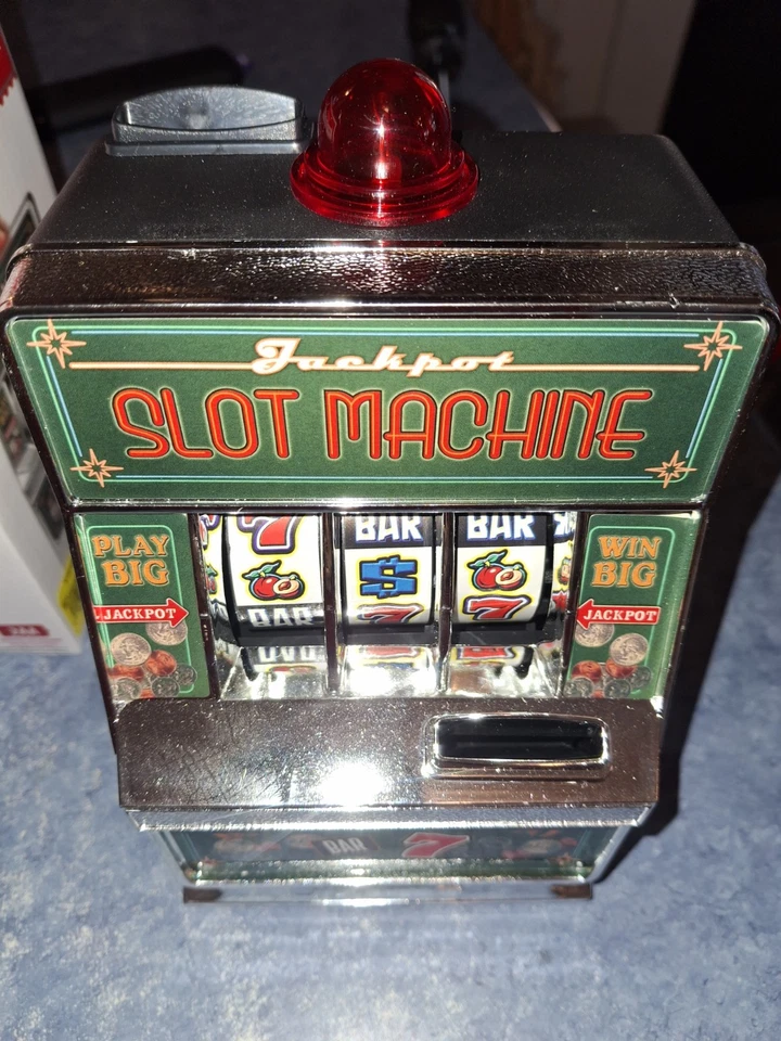 Banco Mini máquina tragamonedas Holiday Time - Luces y sonido - Palanca de tracción. Caja abierta nueva Foto 4 de 4