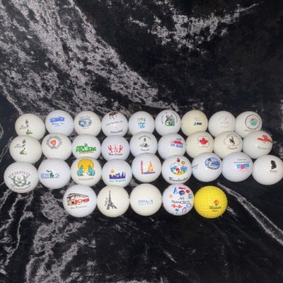 32 souvenir balls from different states/Countries