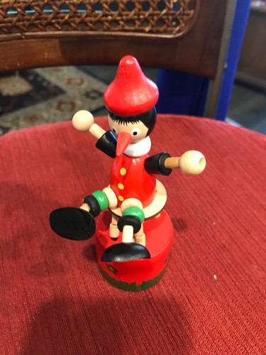 Wooden Wood Pinocchio Sitting Collapsing Push Up Toy Push Button Toy 4.5"