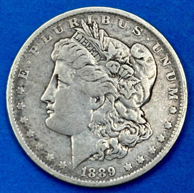 1889-O Morgan Silver Dollar Grade is VERY GOOD/FINE Silver Morgan Dollar #M117