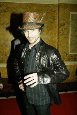 Jay Kay a.k.a. Jamiroquai enjoys himself at 2003 Brit Awards after- Old Photo 15