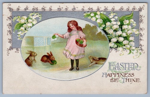 Postcard Easter 1914 Girl feeding rabbits Bunnies - Picture 1 of 2