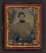 Photo: Unidentified soldier in Confederate frock coat and kepi