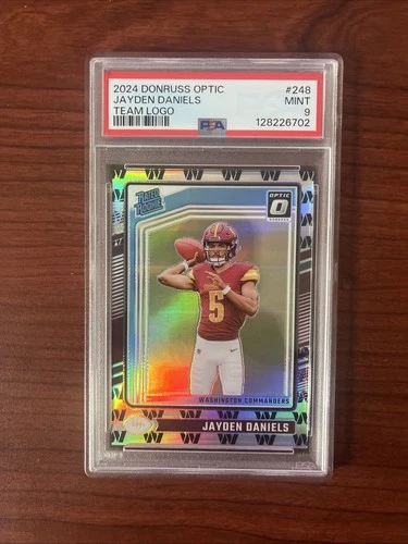 2024 Panini Donruss Optic Rated Rookie Jayden Daniels #248 Team Logo /32 PSA 9