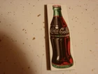 COCA-COLA MAGNET OF COCA-COLA BOTTLE  3 1/4 INCHES TALL  VINTAGE OLD