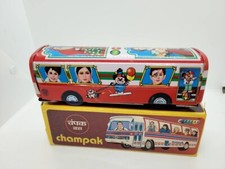 VINTAGE TIN LITHO CHAMPAK RED FRICTION OPERATED BUS with SANTA CLAUS and BOX