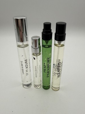 Bundle of 4 travel size perfume sprays Authentic Items Exactly As Pictured.