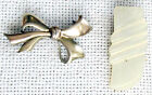 Lot: 2 Art deco Jewelry items: silver brooch and mother of pearl clip