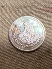The American Prospector 2010 1 Gram Rising Sun .999 Silver Round