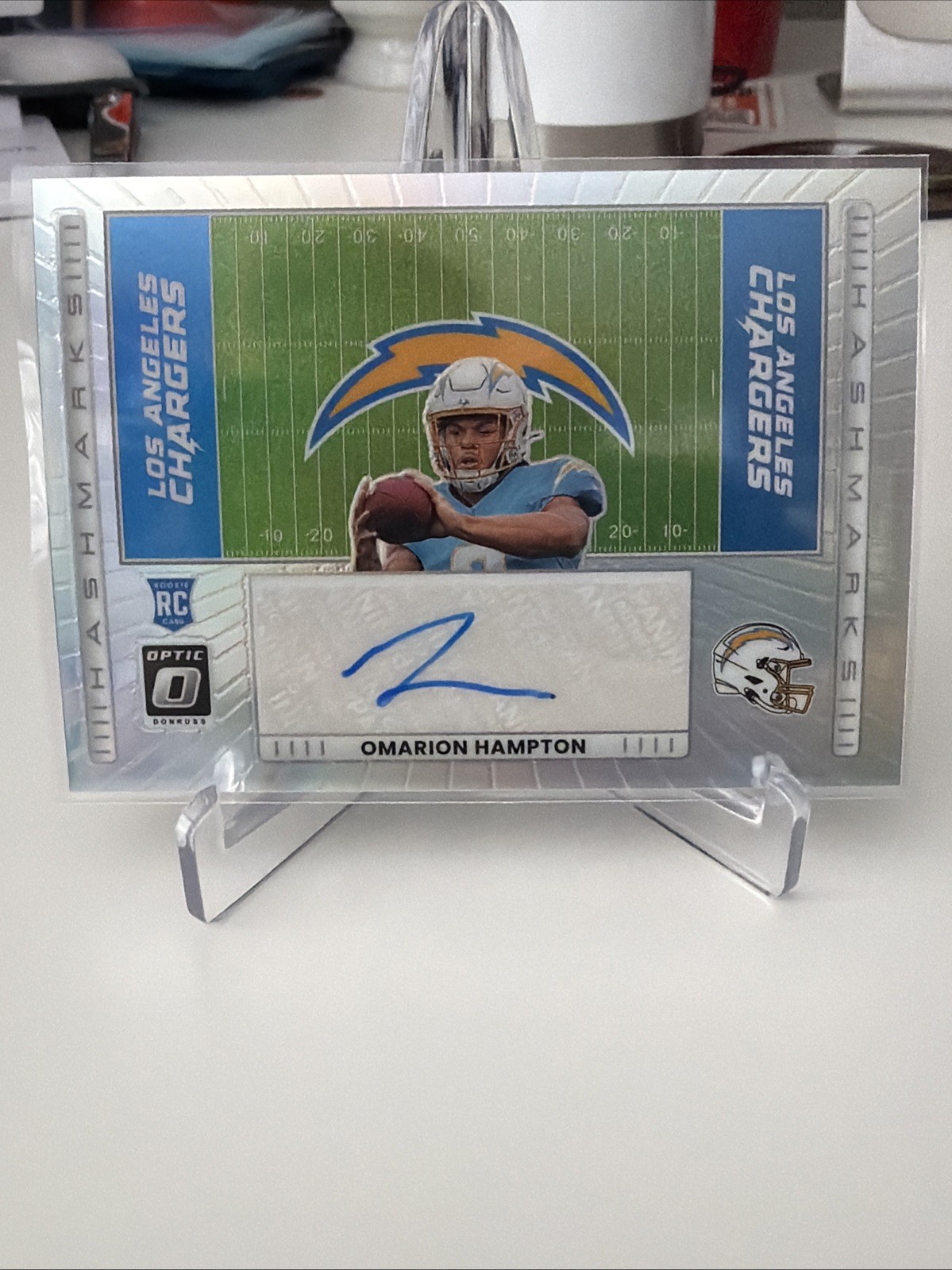 2025 Panini Optic Omarion Hampton Hashmarks Autograph RC #HM-OH SP