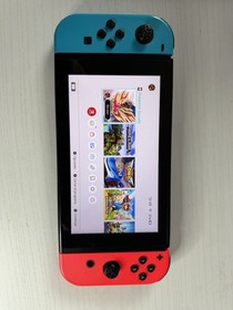 Nintendo Switch Console with Neon Blue & Red Joy-Con Controllers and Dock