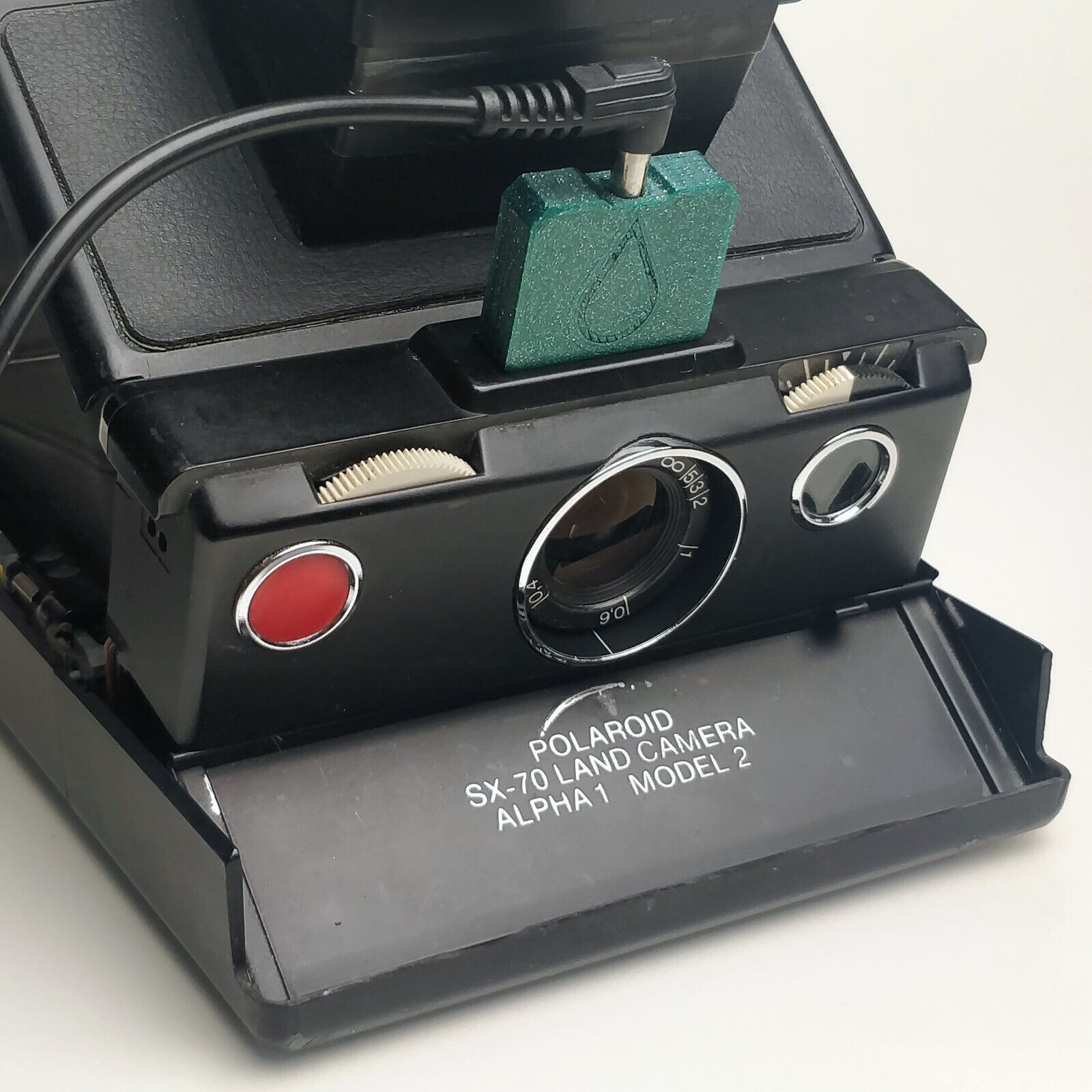 Adaptateur Flash Polaroid SX-70 pour photographier vos soirées et portraits en intérieur