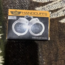 Uzi Handcuffed 