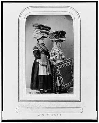 Neapolitan Peasants,women carrying bundles of carpet on heads,Naples,Italy,1869