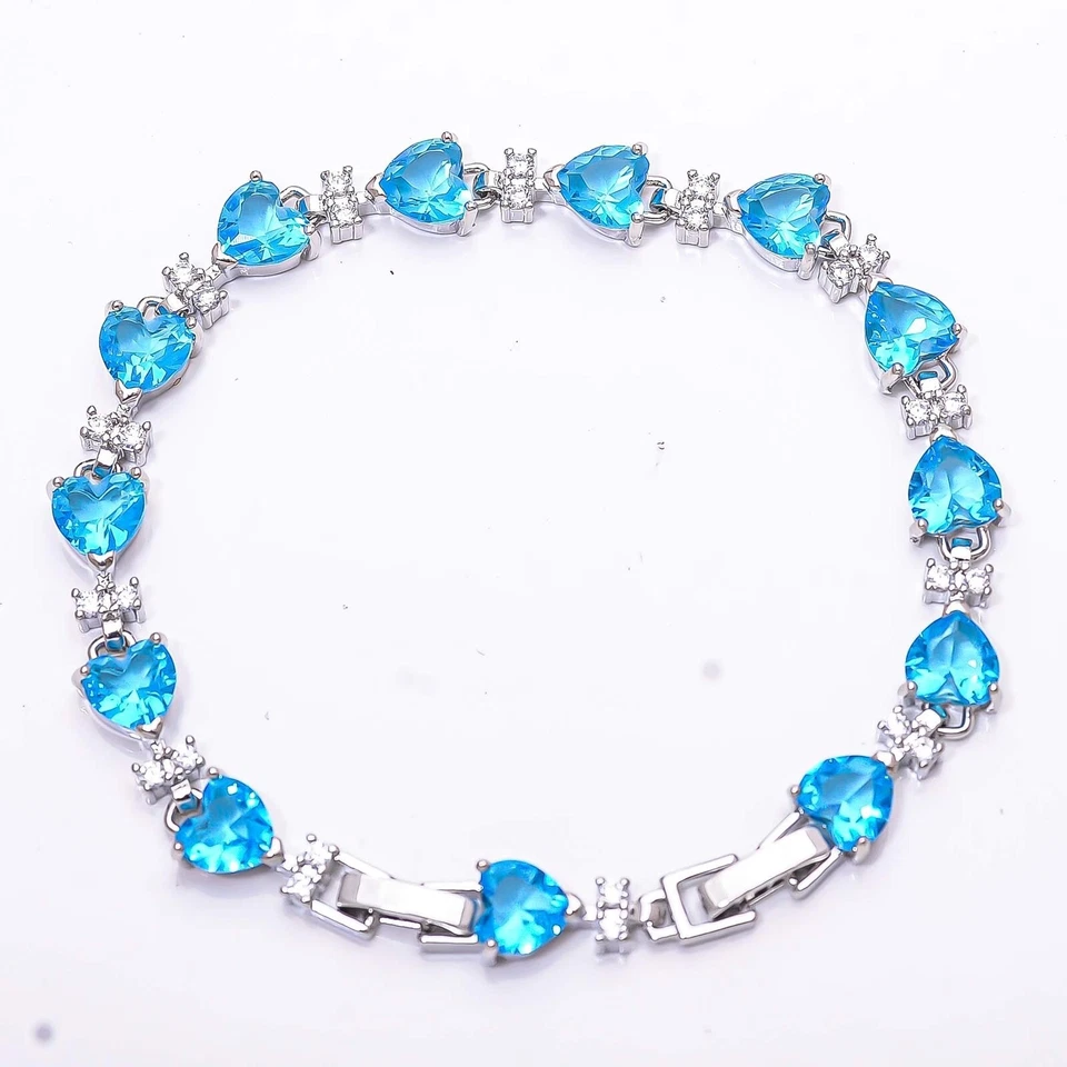 Brazalete Tenis Topacio Azul Simulado Corte Corazón 10 Ct Chapado en Oro Blanco 14K Foto 4 de 4