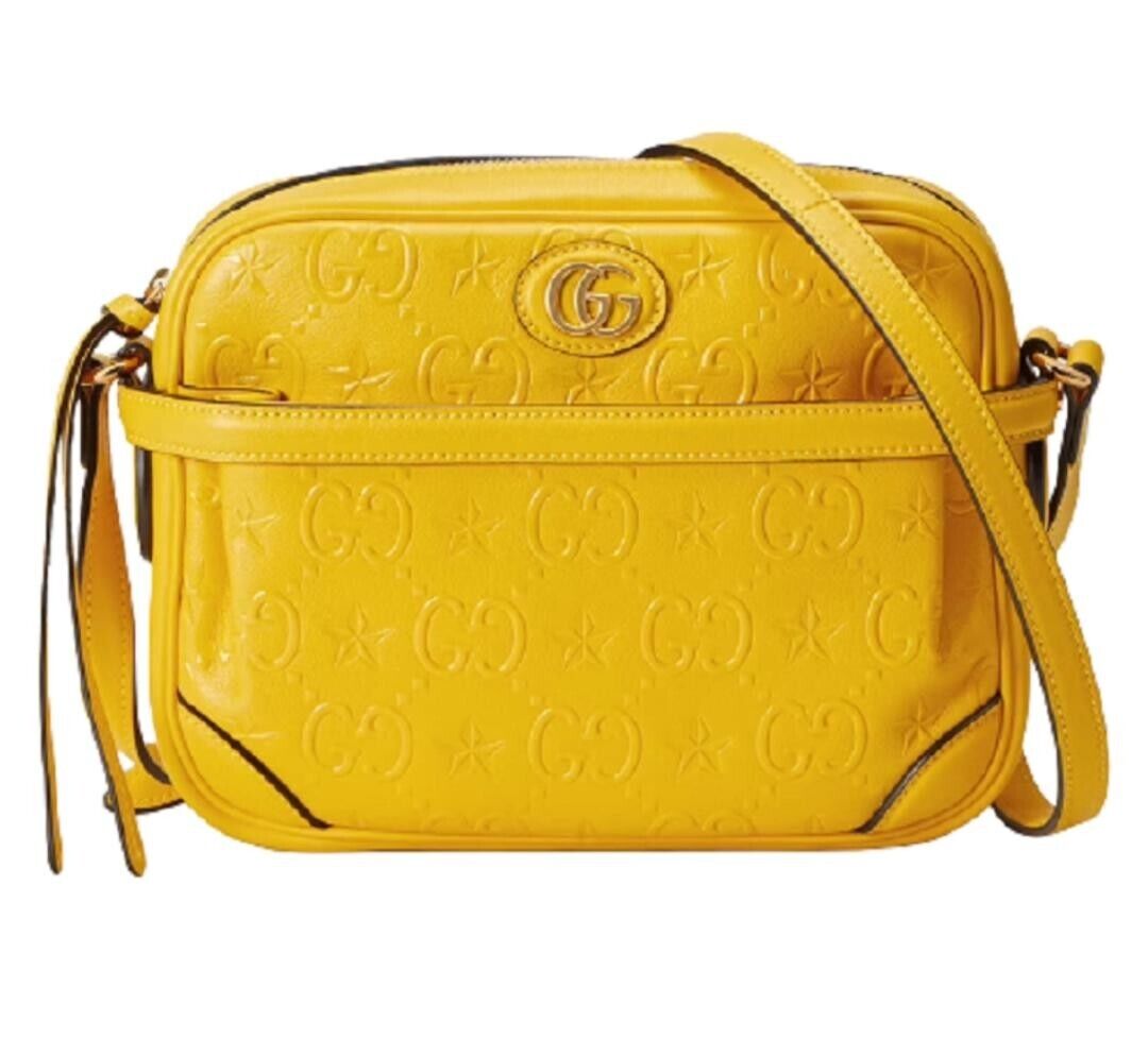 $2,490 GUCCI GG Embossed Star Cross Body Shoulder Bag Yellow $2,490 GUCCI GG Embossed Star Cross Body Shoulder Bag Yellow