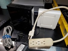 ARRIS SURFboard SB6141 Netgear N300 Wirless Router WNR2000 v4 Power Strip cable