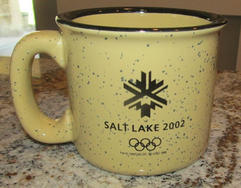 2002 Winter Olympics Coffee Mug Cup Salt Lake City Utah Yellow w/ Black Speckled