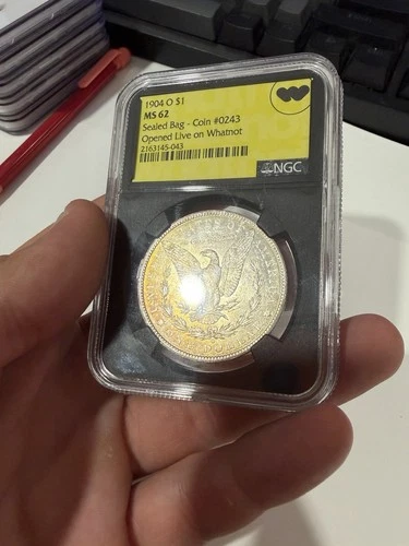 1904-O Morgan Silver Dollar – NGC MS62 – Natural Toning – Fresh from Sealed Bag