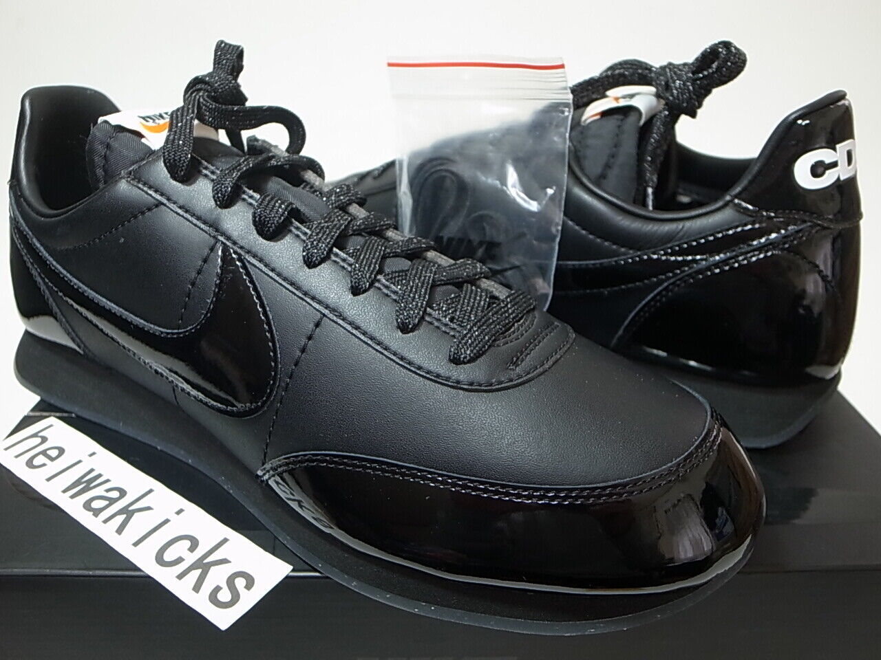 nike night track comme des garcons black