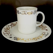4 Rosanna Cup and Plate Sets Jingle Bells gold on white porcelain  7.25”