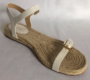 white and gold flat sandals