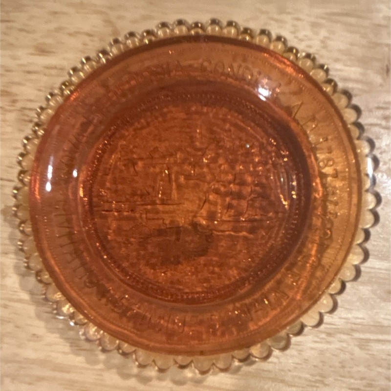 Amber Pairpont Pressed Glass Round Beaded Edge Raised Sailing Ship Design