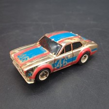 Vintage Aurora AFX Ford Escort Gold Chrome with Blue and Red Stripes Doesn't Run