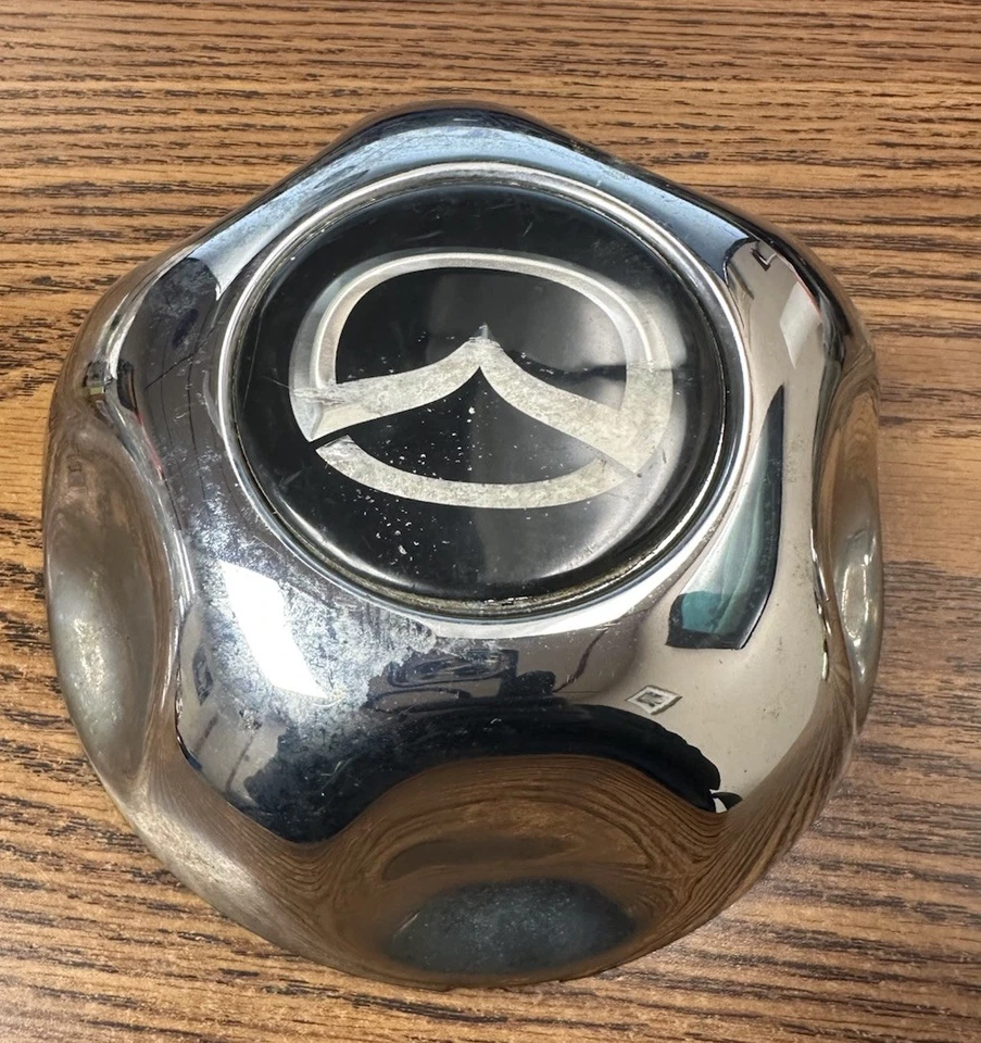 OEM 1998-2006 MAZDA B2300 B3000 B4000 TAPACUBOS TAPA CENTRAL RUEDA ACERO CROMADO Foto 2 de 4