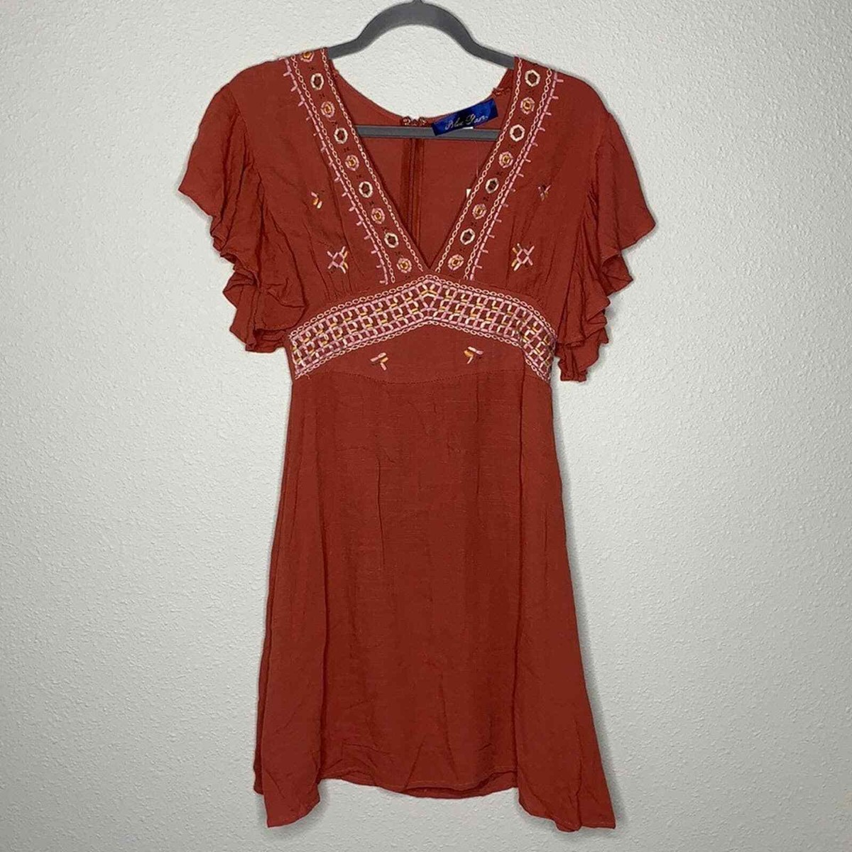 flowy rust dress Rust Flowy Fit Dress with Long Sleeves and Ruffle Detail – main image 0